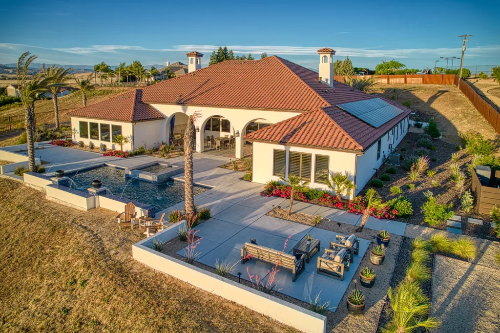 Aerial view of the pool terrace, loggia, and covered outdoor living area at Friant Estate.