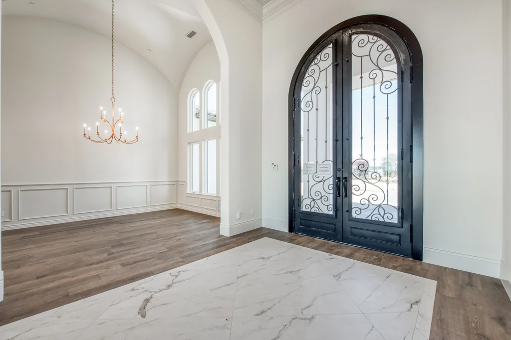Foyer looking back toward the arched iron front door at Kings Estate.