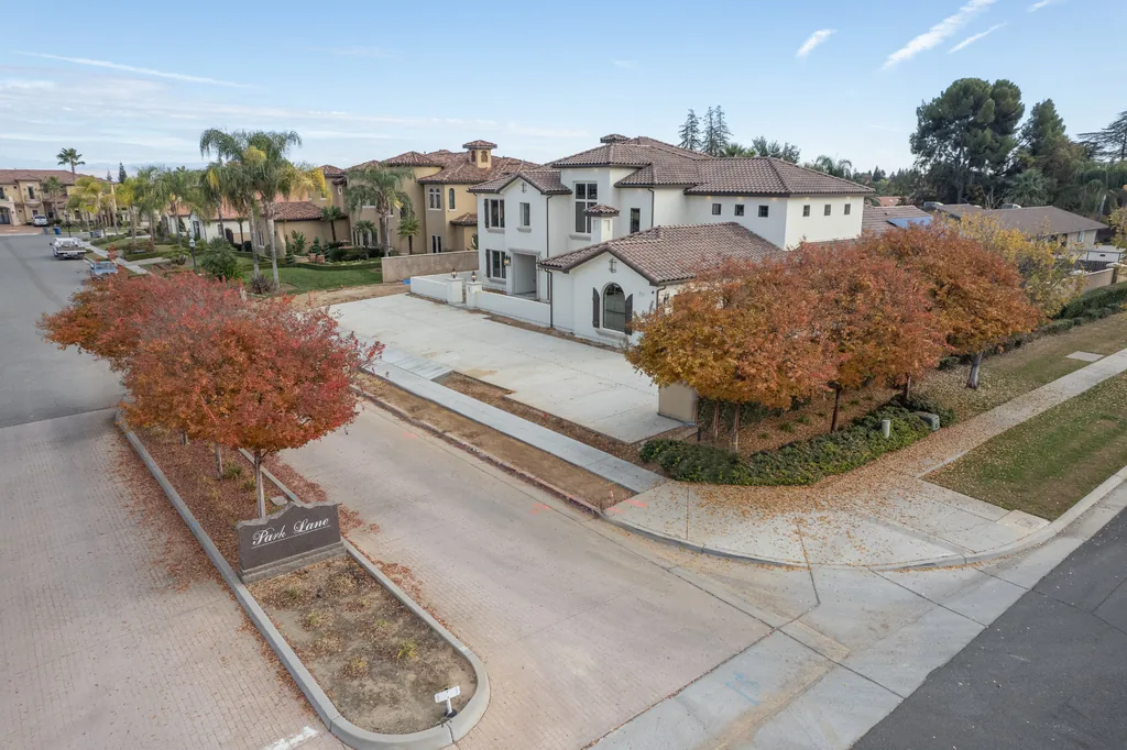 Aerial view of the front elevation and street approach at Sawgrass Estate.