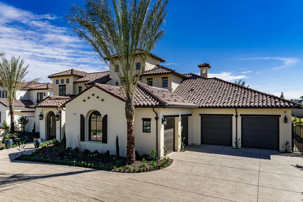 Three-car garage elevation and expansive motor court at Spey Valley Estate I.